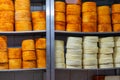 Stack of Artisan Cheese Wheels at the Market Royalty Free Stock Photo