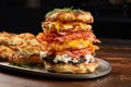 stack of assorted bagels with different flavors