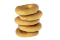 A stack of assorted bagels on white background
