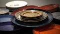 Stack of Assorted Colorful Ceramic Plates and Bowls in a Pile Keywords: plates, bowls, dishes, ceramic, pottery Royalty Free Stock Photo