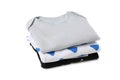 Stack of baby clothes isolated on background Royalty Free Stock Photo
