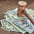 Stack Of Banknotes With Judges Or Auctioneers Gavel Or Hammer Royalty Free Stock Photo