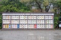 stack of barrels of sake offered in Meiji-Jingu Shrine in Tokyo, a religious temple in Tokyo, Japan