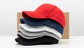 Stack of Baseball Caps Red, Navy, White, Grey, Black - Fashion Apparel Royalty Free Stock Photo