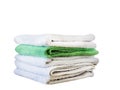 Stack of bath towels on light wooden background closeup.Pile of rainbow colored towels.Top view. Royalty Free Stock Photo