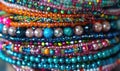 A stack of beaded bracelets in vibrant colors Royalty Free Stock Photo