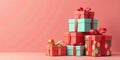 Stack of Colorful Gift Boxes on a Pink Background Royalty Free Stock Photo