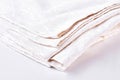 Stack of bed natural linen clothing.