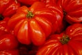 Stack of Beefsteak tomato on a market stall Royalty Free Stock Photo