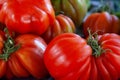 Stack of Beefsteak tomatoes on a market stall Royalty Free Stock Photo