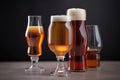 stack of beer glasses with foamy head and rich amber liquid