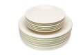 Stack of beige plates and saucers