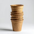 Stack of Biodegradable Peat Pots for Seedlings on White Background Royalty Free Stock Photo