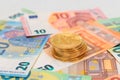 A Stack of Bitcoin Coins on the Euro Banknotes Royalty Free Stock Photo