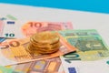 A Stack of Bitcoin Coins on the Euro Banknotes Royalty Free Stock Photo