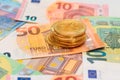 A Stack of Bitcoin Coins on the Euro Banknotes Royalty Free Stock Photo
