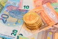 A Stack of Bitcoin Coins on the Euro Banknotes Royalty Free Stock Photo