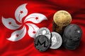 Stack of Bitcoin coins on Hong Kong flag. Situation of Bitcoin and other cryptocurrencies in Hong Kong