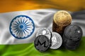 Stack of Bitcoin coins on Indian flag. Situation of Bitcoin and other cryptocurrencies in India