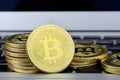 Stack of Bitcoin coins on laptop keyboard. Cryptocurrency. Selective focus Royalty Free Stock Photo