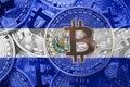 Stack of Bitcoin El Salvador flag. Bitcoin cryptocurrencies concept. BTC background.