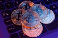Stack of Bitcoins on keyboard Royalty Free Stock Photo