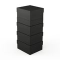 Stack of black cardboard boxes against white background Royalty Free Stock Photo