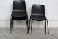 Stack of Black Chairs Royalty Free Stock Photo