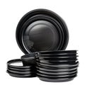 Stack of Black Disposable Plastic Plates and Ramekins on White Background Keywords: plates, disposable, plastic Royalty Free Stock Photo