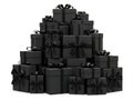 Stack of black gift boxes with ribbons for holiday and celebration decoration and presentation Royalty Free Stock Photo