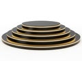 Stack of black and gold plates isolated on white background Royalty Free Stock Photo