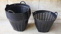 Stack of Black Plastic Strainer Baskets, Plant pot Royalty Free Stock Photo
