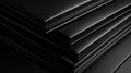A stack of black rectangular objects with a glossy finish. Royalty Free Stock Photo