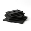Stack of black rectangular objects on white background Royalty Free Stock Photo
