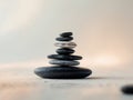 Stack black stones balanced top each other middle peace found Royalty Free Stock Photo