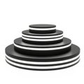 Stack of black and white disks isolated on white background Royalty Free Stock Photo