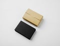 Stack of blank black business cards and craft Cards box on white background