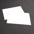 Stack of blank business card on white textured background Royalty Free Stock Photo