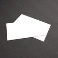 Stack of blank business card on white textured background Royalty Free Stock Photo