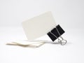 Stack of blank business cards and a blank business card held by binder clip Royalty Free Stock Photo