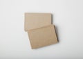 Stack of blank craft business cards on white background with soft shadows. Royalty Free Stock Photo