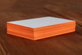 Stack of blank layered business cards with painted edges Royalty Free Stock Photo