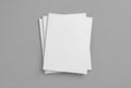 Stack of blank magazines mockup on gray background Royalty Free Stock Photo