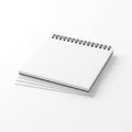Stack of blank spiral-bound notebooks with white paper and black binding Royalty Free Stock Photo