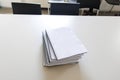 stack of blank spiral notebooks on a classroom table ready for student use during lessons Royalty Free Stock Photo