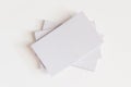 Stack of blank white business cards. Mockup business cards on white background with clipping path Royalty Free Stock Photo