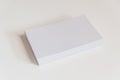 Stack of blank white business cards. Mockup business cards on white background with clipping path Royalty Free Stock Photo