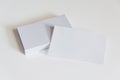 Stack of blank white business cards. Mockup business cards on white background with clipping path Royalty Free Stock Photo