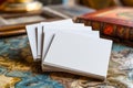 Stack of Blank White Business Cards on Vintage Map Desk with Antique Objects in Background