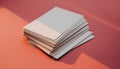 Stack of Blank White Cards on Textured Red Surface Royalty Free Stock Photo